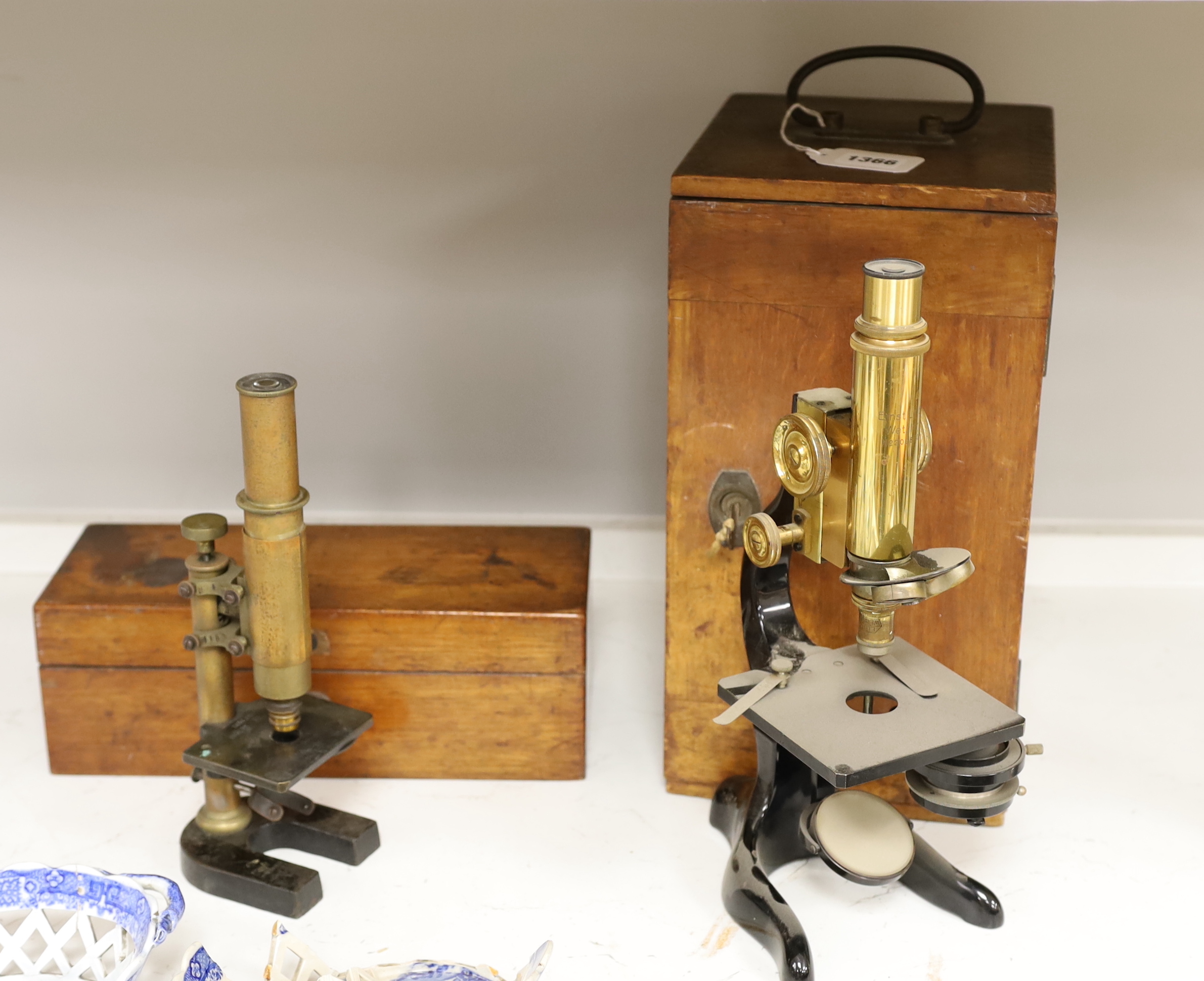 Two cased Leitz Wetzlar microscopes, largest 30cm high